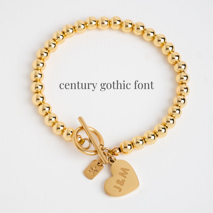 Engravable Heart Pendant on Handbeaded Gold Bracelet