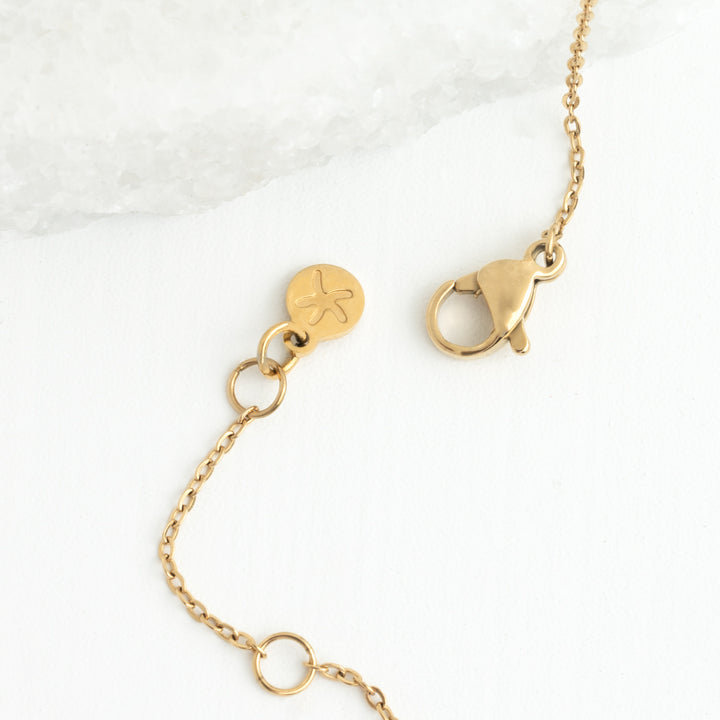 Radiant Cross Necklace in Gold